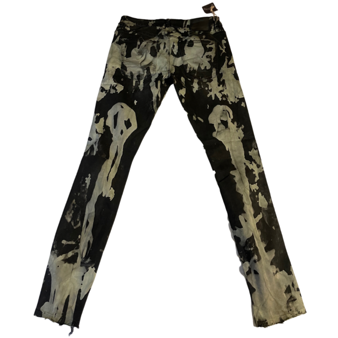 Ourlets skinny décolorés à motif tête de mort vert